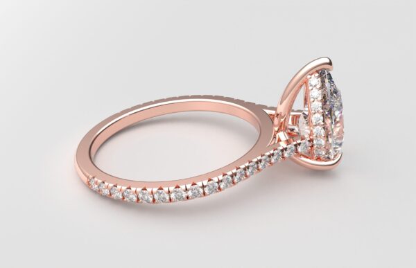 side view cathedral setting pear cut diamond with hidden halo ring with a simple prong setting in rose gold color and french paved diamonds band