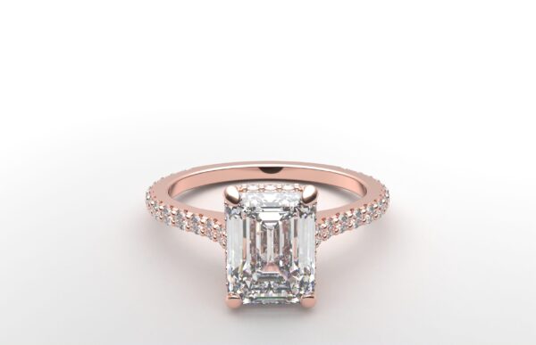 modern emerald cathedral setting diamond with hidden halo ring with a classic prong setting in rose gold color and french paved round diamonds band