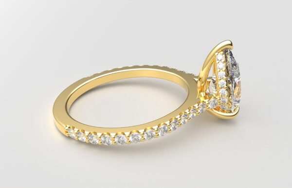 side view modern pear cathedral setting diamond with hidden halo ring with a classic prong setting in yellow gold color and french paved round diamonds band