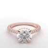 modern round cathedral setting diamond with hidden halo ring with a classic prong setting in rose gold color and french paved round diamonds band