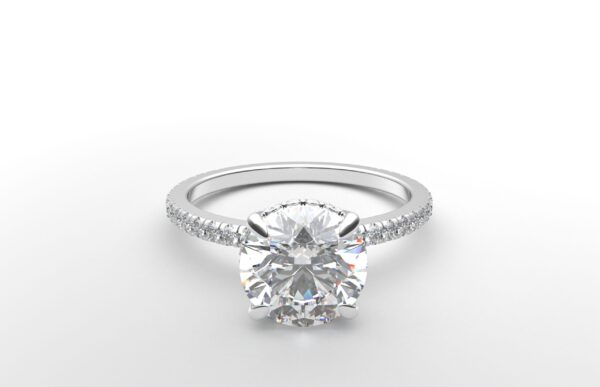 round diamond with hidden halo ring with a classic 4 prong setting in white gold color and french paved diamond band