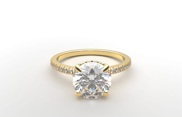 round diamond with hidden halo ring with a classic 4 prong setting in yellow gold color and french paved diamond band