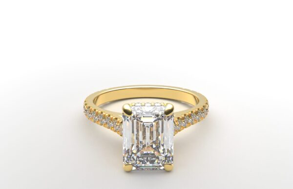 modern cathedral setting french pave emerald diamond ring in yellow gold with a hidden halo