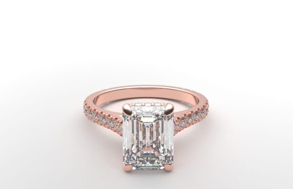 modern cathedral setting french pave emerald diamond ring in rose gold with a hidden halo