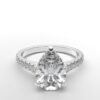 modern catherdral setting french pave pear diamond ring in white gold with a hidden halo