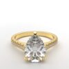 modern catherdral setting french pave pear diamond ring in yellow gold with a hidden halo