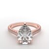 modern catherdral setting french pave pear diamond ring in rose gold with a hidden halo