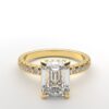 classic french pave emerald diamond ring in yellow gold with a hidden halo