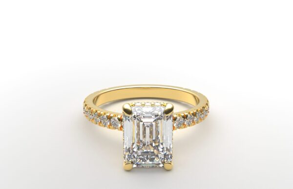 classic french pave emerald diamond ring in yellow gold with a hidden halo