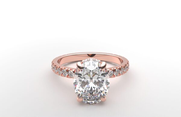 classic french pave oval diamond ring in rose gold with a hidden halo