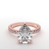 classic french pave pear diamond ring in rose gold with a hidden halo