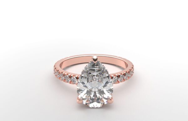 classic french pave pear diamond ring in rose gold with a hidden halo