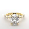 Oval solitaire diamond ring in yellow gold with round and marquise diamond band hidden halo