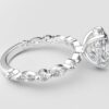 side view oval solitaire diamond ring in white gold with round and marquise diamond band hidden halo