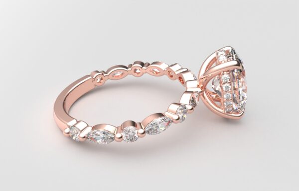 side view oval solitaire diamond ring in rose gold with round and marquise diamond band hidden halo