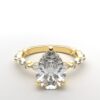 pear solitaire diamond ring in yellow gold with round and marquise diamond band hidden halo