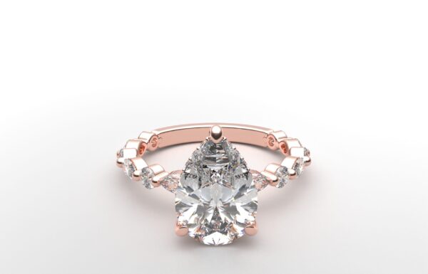 pear solitaire diamond ring in rose gold with round and marquise diamond band hidden halo