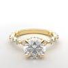 Round solitaire diamond ring in yellow gold with round and marquise diamond band hidden halo