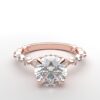 round solitaire diamond ring in rose gold with round and marquise diamond band hidden halo