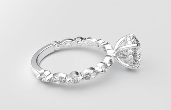 side view round solitaire diamond ring in white gold with round and marquise diamond band hidden halo