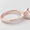 Side view Classic single shared prong tulip setting emerald diamond rose gold ring