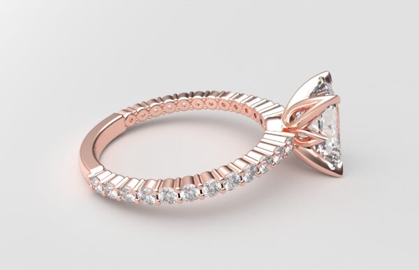 Side view Classic single shared prong tulip setting emerald diamond rose gold ring