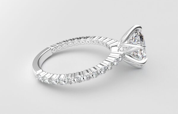 Side view Classic single shared prong tulip setting oval diamond white gold ring 6 prong