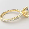 Side view Classic single shared prong tulip setting oval diamond yellow gold ring 6 prong