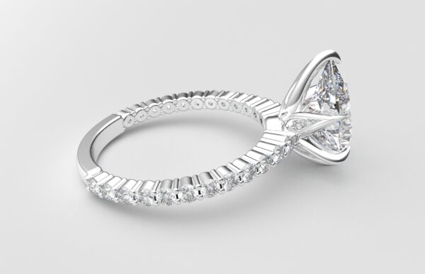 Side view Classic single shared prong tulip setting pear diamond white gold ring 6 prong