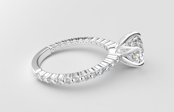 Side view Classic single shared prong tulip setting round diamond white gold ring 6 prong