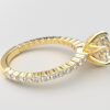 Side view Classic single shared prong tulip setting round diamond yellow gold ring 6 prong