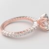 Side view Four prong shared setting tulip crown oval diamond rose gold ring